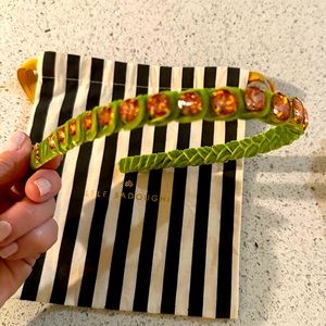 Lele Sadoughi headband.  Green with pink stones..